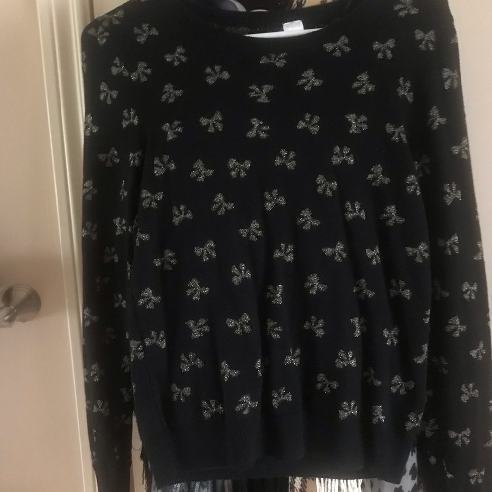 Sweater with gold bows